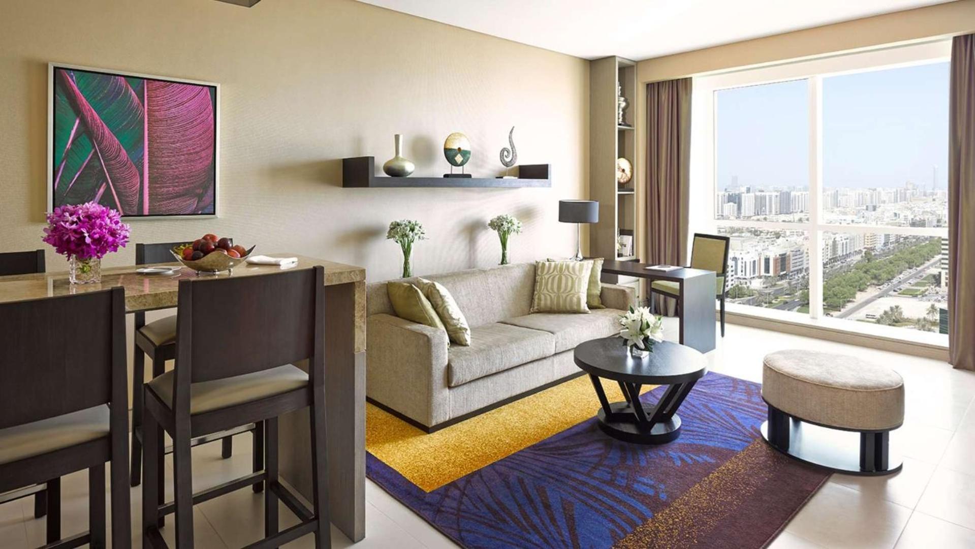 Dusit Thani Абу-Даби Экстерьер фото A living room at the W Hotel in Shanghai, China